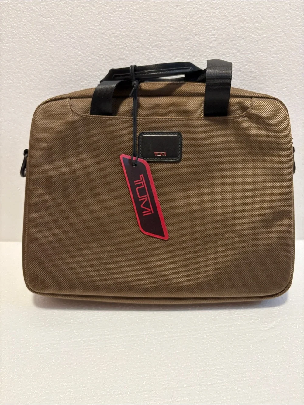 Tumi Brown Men's small carryall for IPad, Kindle. 12”x 9”